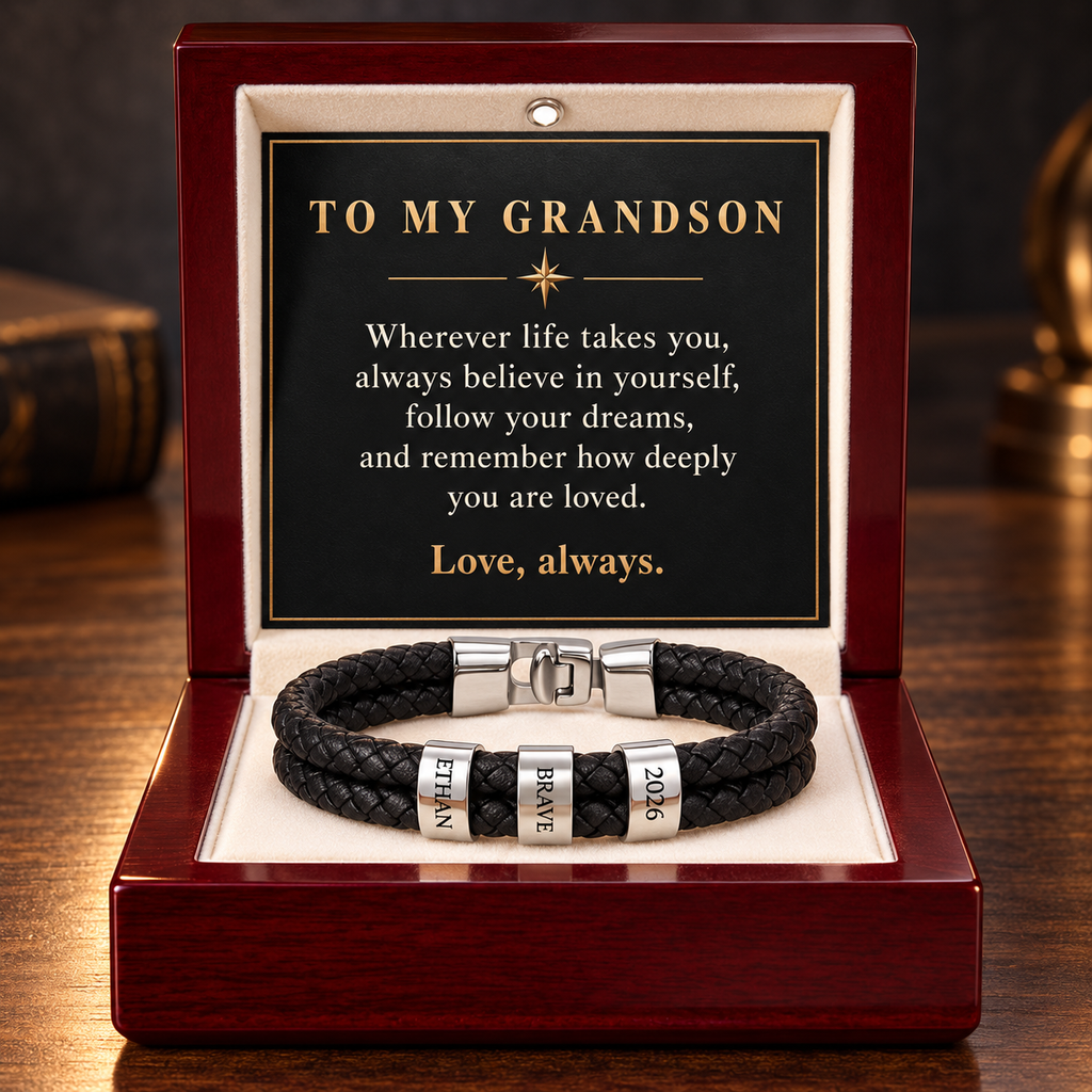 Silver-finish personalized bracelet with three engraved rings in a luxury mahogany gift box for a grandson.
