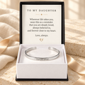 Personalized silver cuff bracelet in a gift box with a message card for daughter