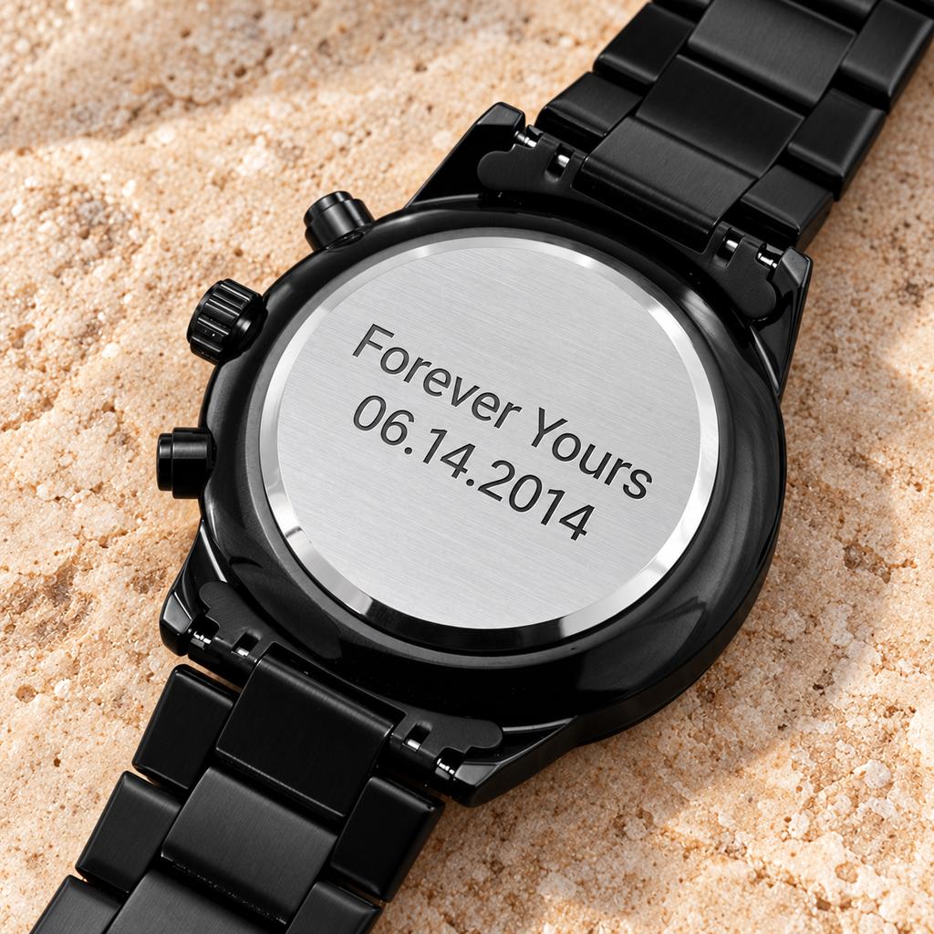 Back of personalized black watch engraved with a custom two-line message and special date